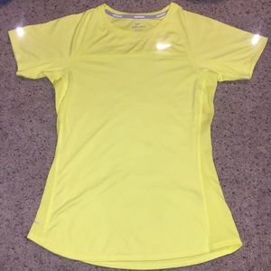 Yellow bike dri-fit top.